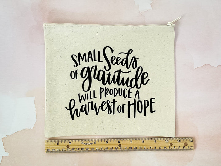 Small Seeds of Gratitude Will Produce A Harvest of Hope Canvas Pouch